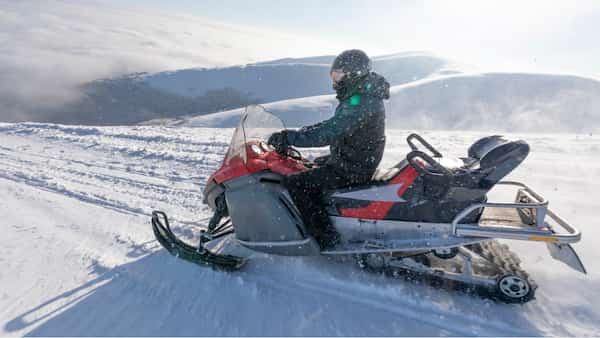 Realice un recorrido en moto de nieve en las montañas de San Juan